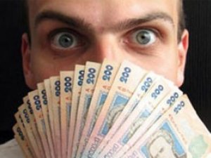 Фото: Українці несуть все більше грошей до банків