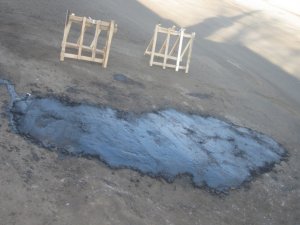 Фото: У Полтаві почали ремонт доріг: засипають ями гарячим асфальтом (фотофакт)