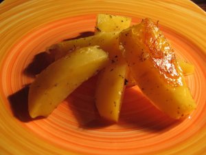 Фото: Печена картопля з розмарином і апельсиновою цедрою