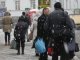 Фото: Сьогодні полтавці ховалися від снігу під парасольками