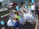 Фото: Полтавою марширували наречені-стихії у весільних сукнях (фото)