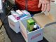 Фото: Журналісти показали міліції, як у Полтаві виборцям вручають аптечки та цукор (відео)