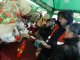 Фото: У Полтаві відсвяткували Масляну під дощем: роздали дві тисячі порцій млинців (фоторепортаж)